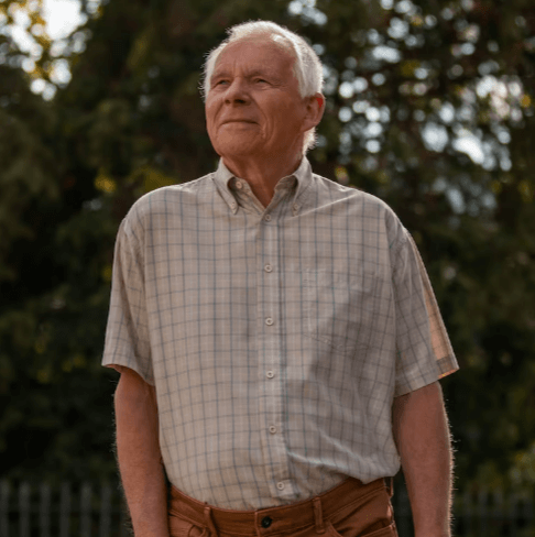 Senior man in a relaxed, natural outdoor portrait