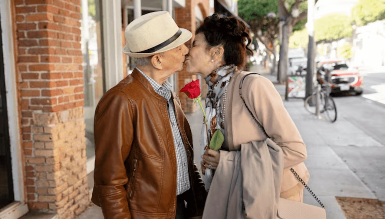 Senior couple comparing dating sites on a tablet
